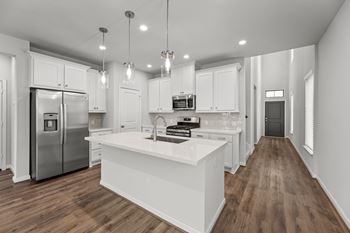 Caso Santa Rita Ranch Rental Homes in Liberty Hill, Texas Kitchen with Stainless Steel Appliances